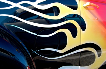 This photo of a Wicked Hot paint job on a 1939 Chevy was taken by Andrew Beierle of Silver Spring, Maryland.  Can you see the 1957 Chevy reflected in the paint?! 